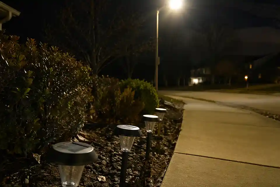 Solar path lights staying off at night near a bright streetlight because ambient light is preventing the dusk sensor from switching on